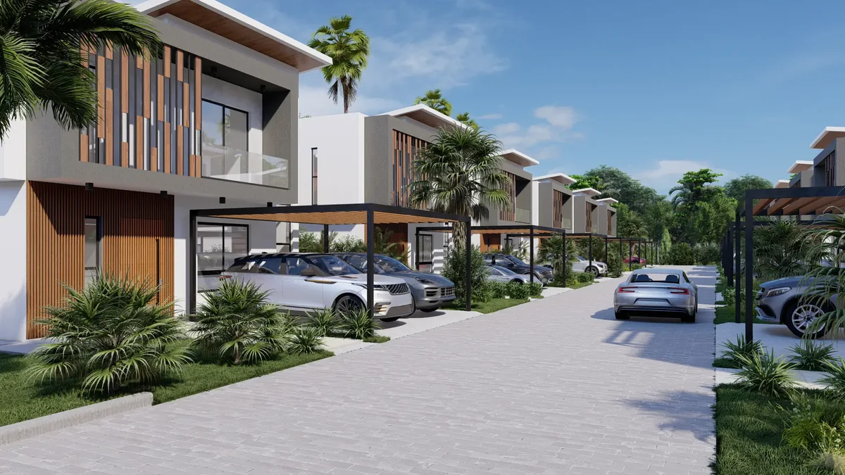 Render de la calle interior de Sunlax, con villas y jardines.